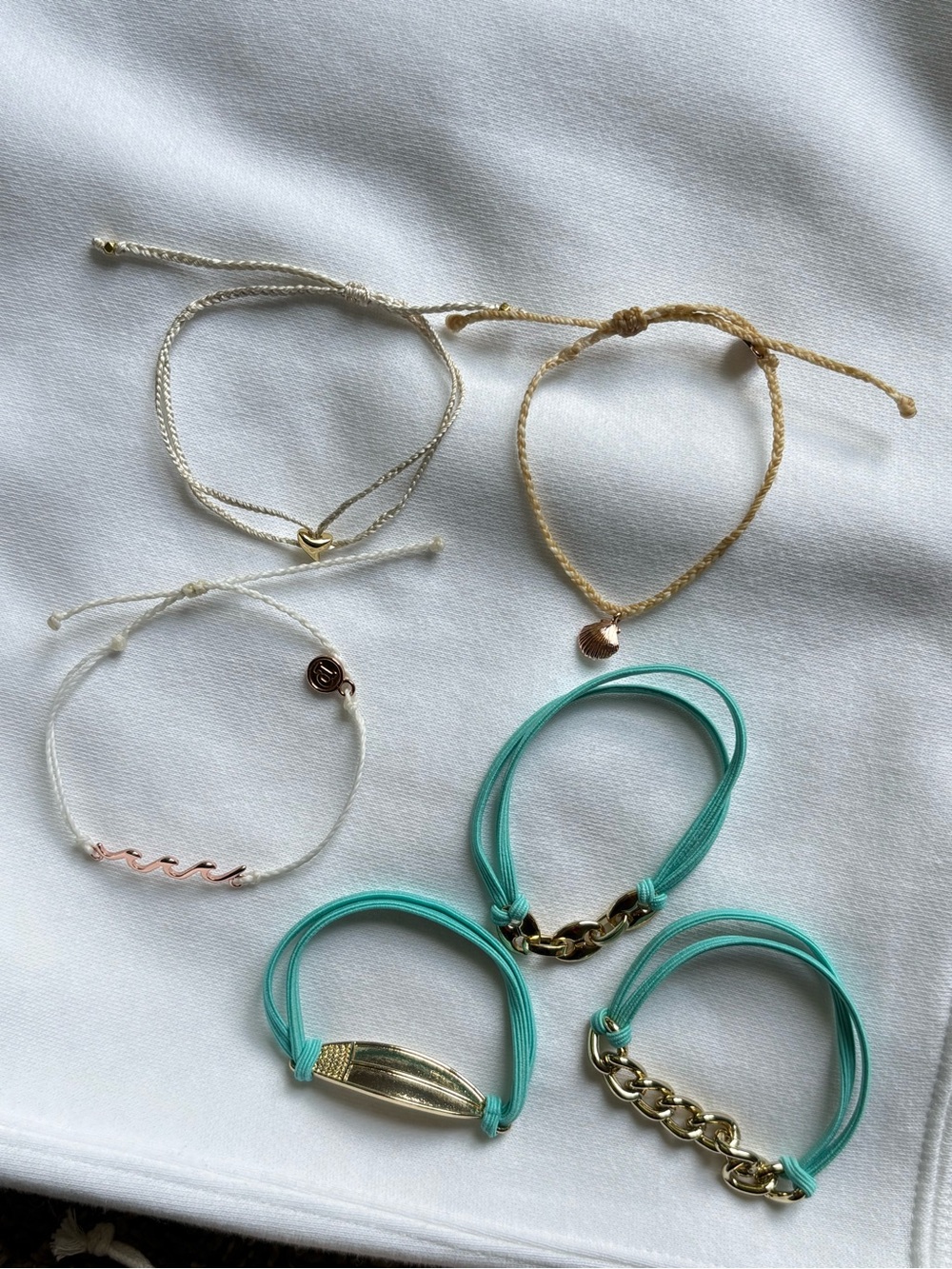 Puts vida beach bracelets and bracelet hair ties, jewelry
